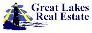 Great Lakes Real Estate logo — a navy lighthouse with yellow beams